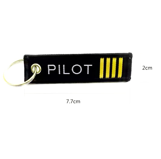 Llavero pequeño con diseño de piloto de aviación